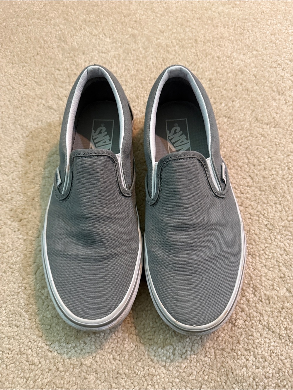 Vans Slip-On Canvas Sneakers in Gray with White Soles
